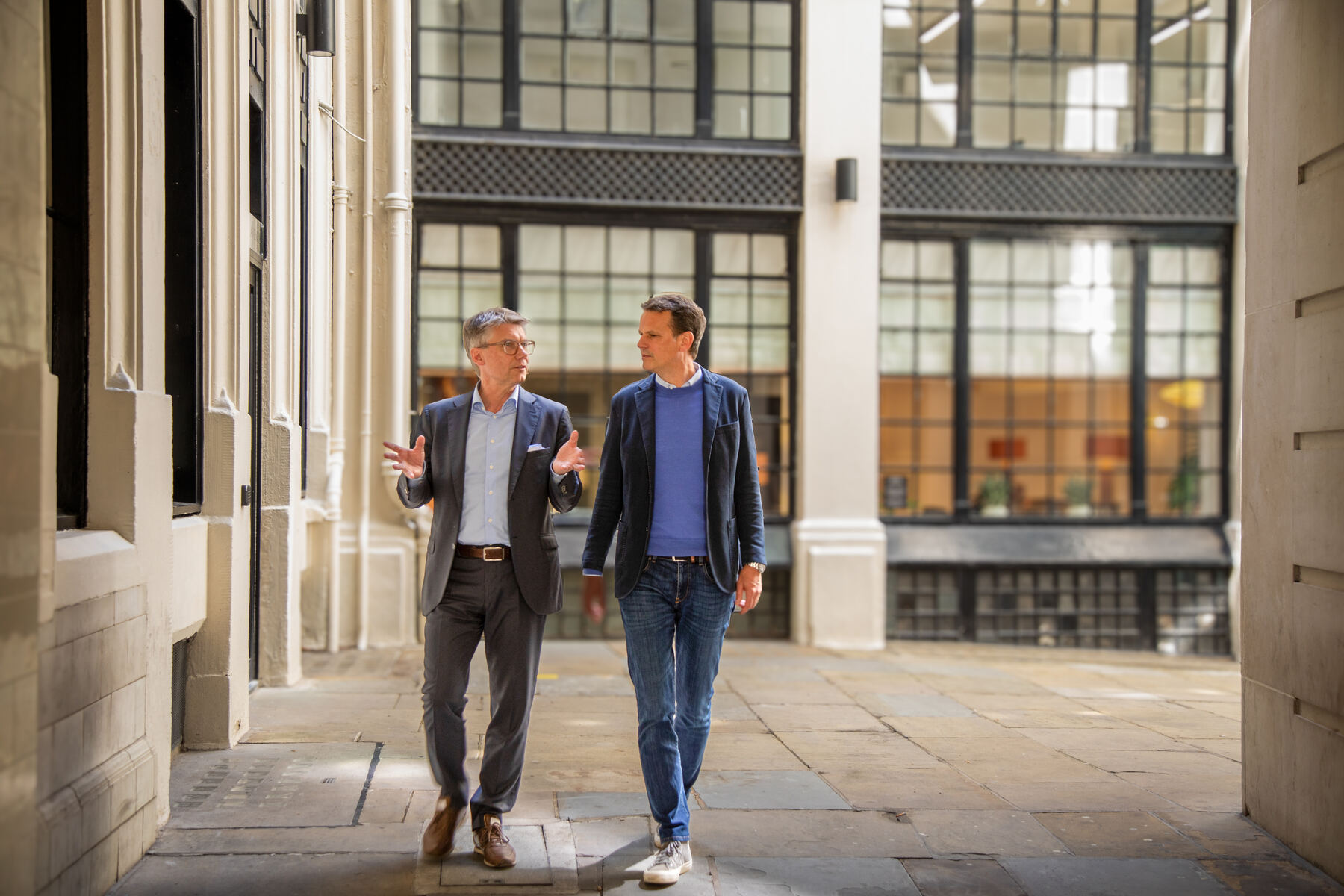 Marco N. Faes and Fredrik Erlandsson walking through the city